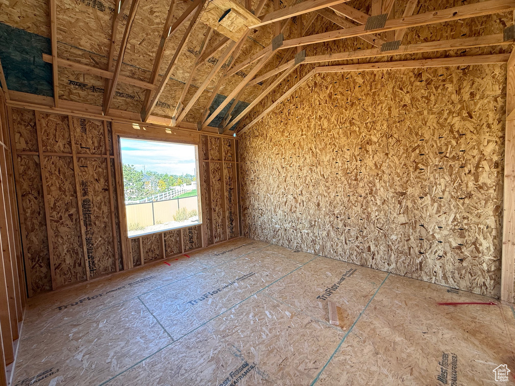 Miscellaneous room with lofted ceiling