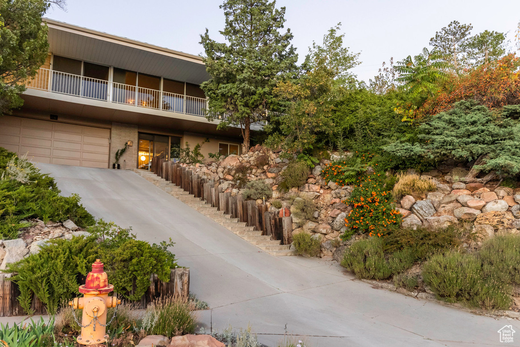 View of property with a garage