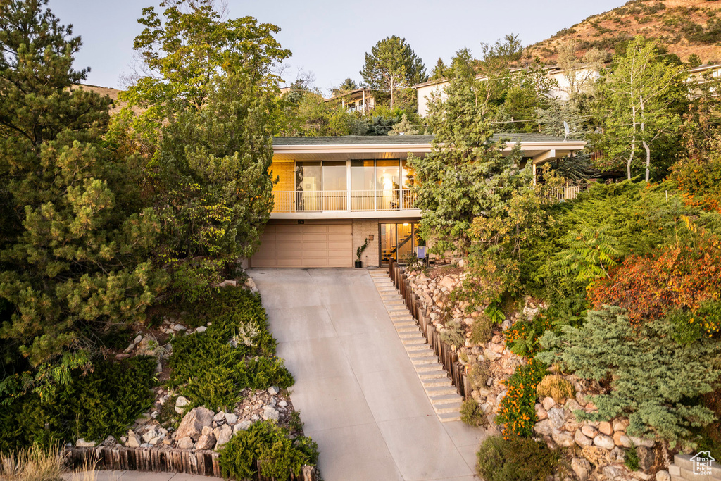 View of front of property featuring a garage