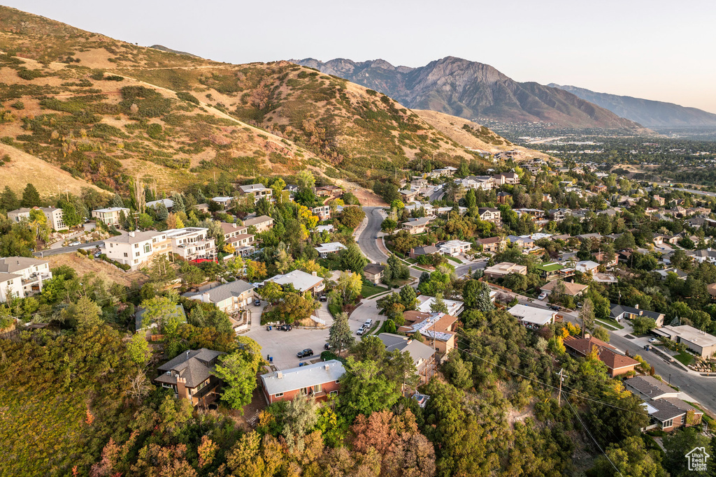 Birds eye view of property with a mountain view