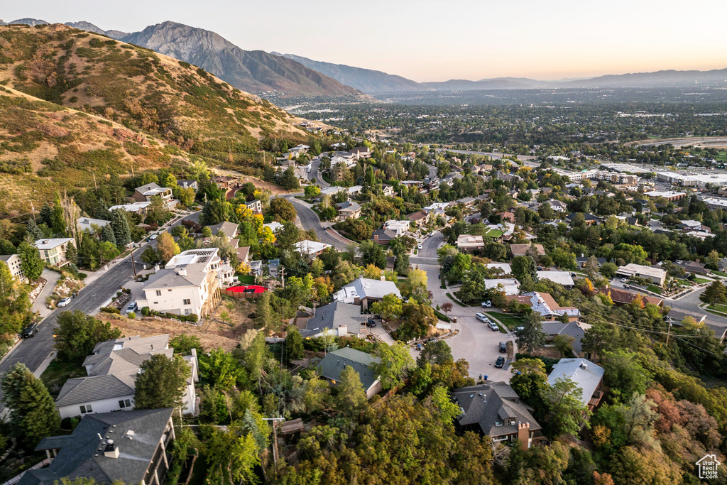 Aerial view at dusk featuring a mountain view