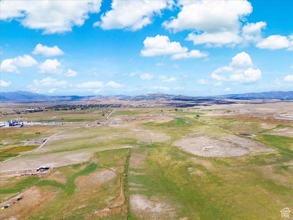 Drone / aerial view featuring a mountain view and a rural view