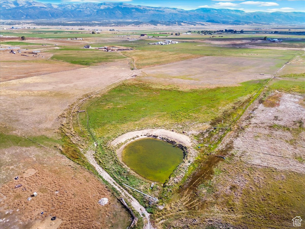 Birds eye view of property featuring a mountain view and a rural view