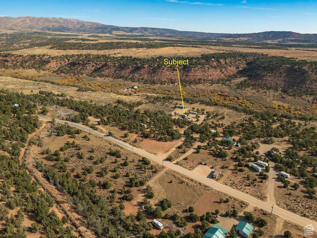 Birds eye view of property featuring a mountain view