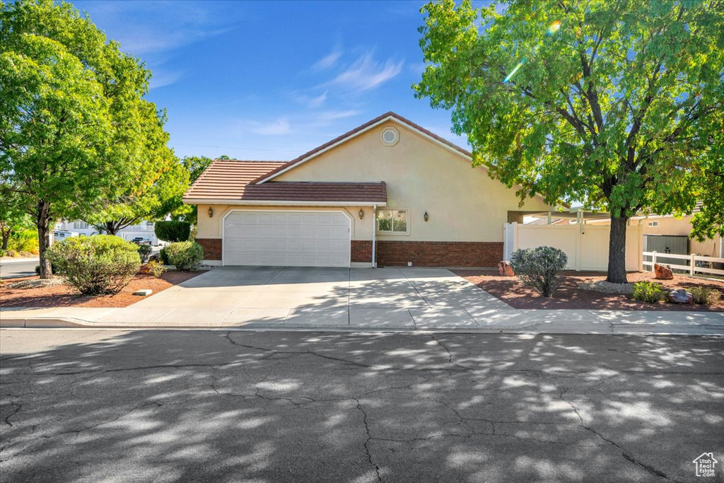 View of front of property featuring a garage