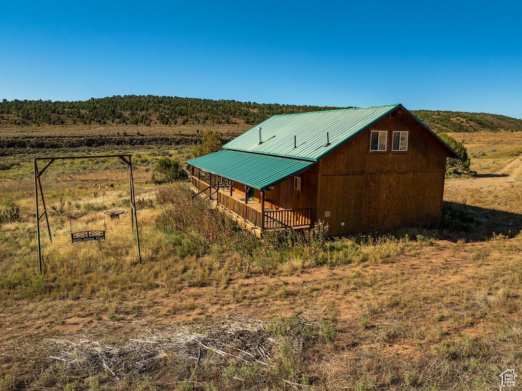 View of outdoor structure with a rural view