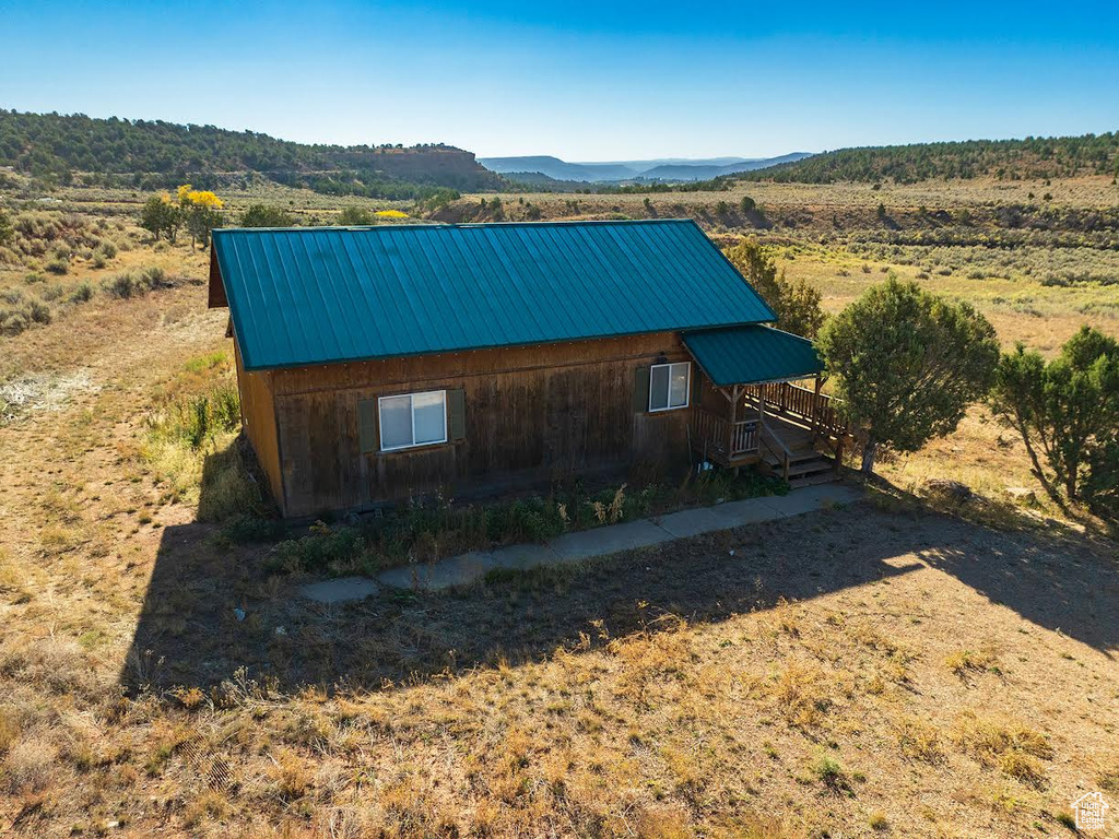 Exterior space featuring a mountain view