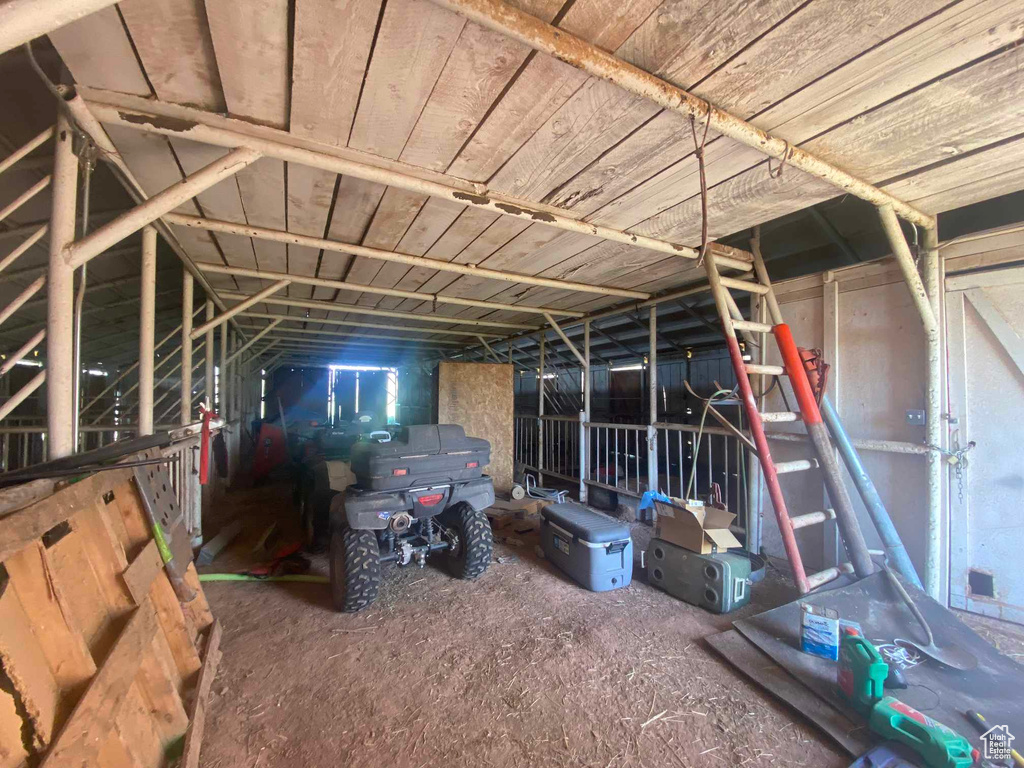 Miscellaneous room featuring lofted ceiling