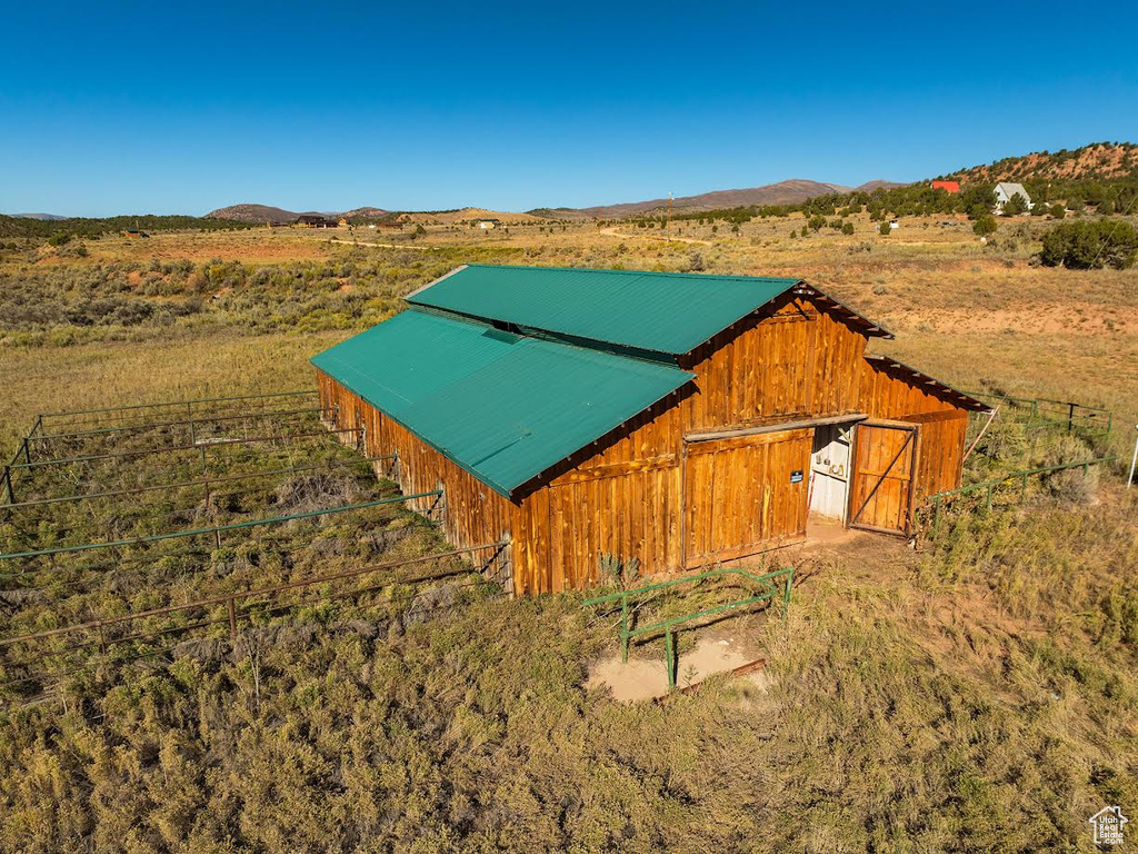 View of outbuilding with a mountain view