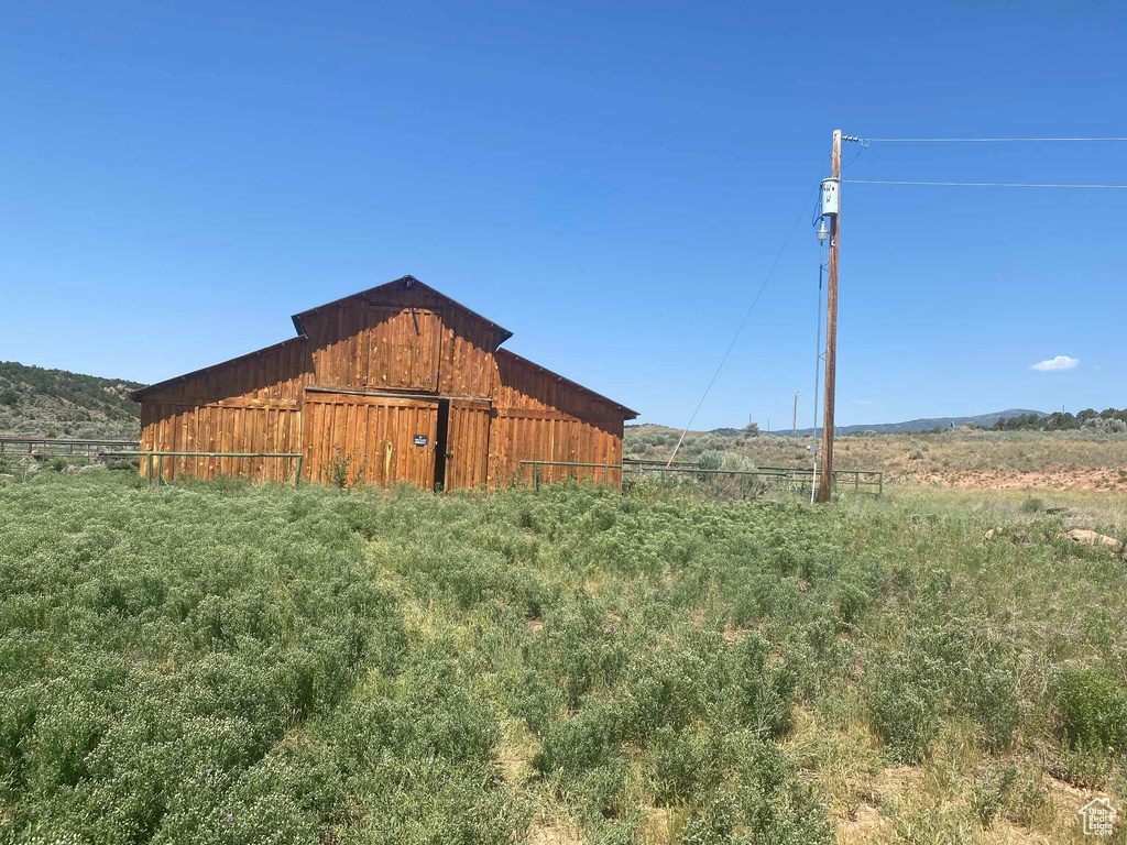 View of outdoor structure featuring a rural view