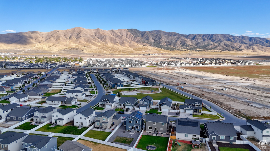 Birds eye view of property with a mountain view