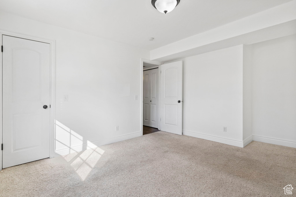 Unfurnished bedroom featuring carpet flooring