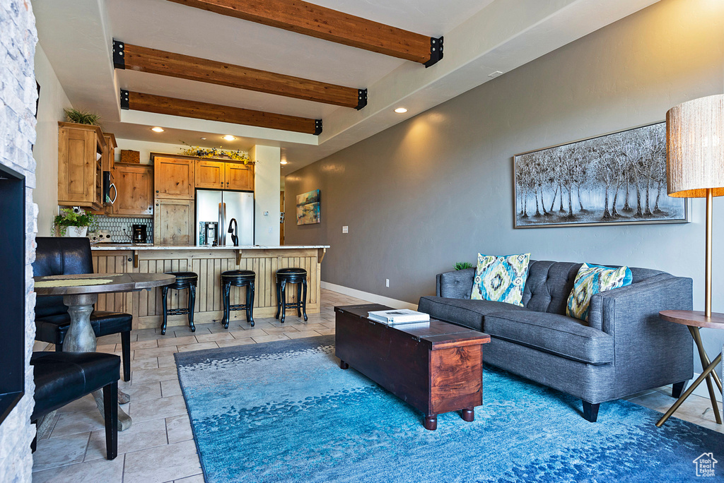 Living room with beamed ceiling