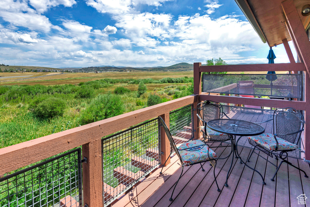 Deck featuring a rural view