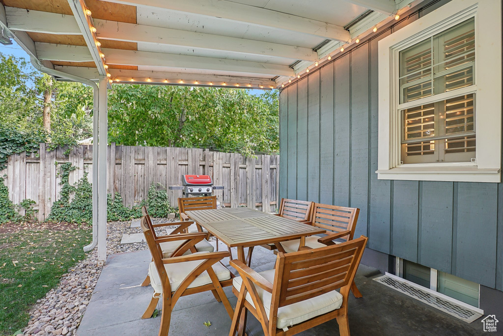 View of patio featuring area for grilling