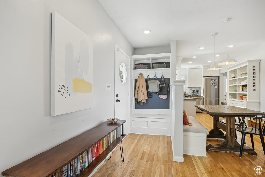 Mudroom with light wood-type flooring