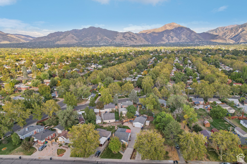 Birds eye view of property with a mountain view