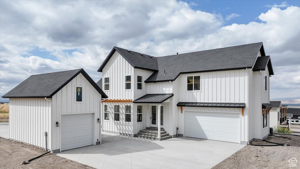 Modern farmhouse featuring a garage