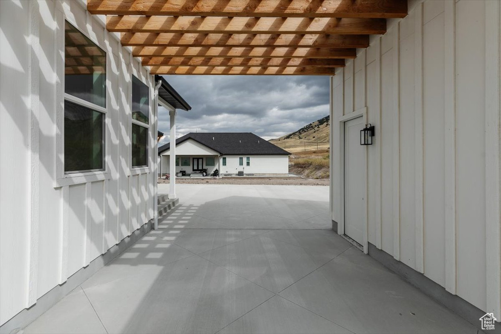 View of patio featuring a pergola