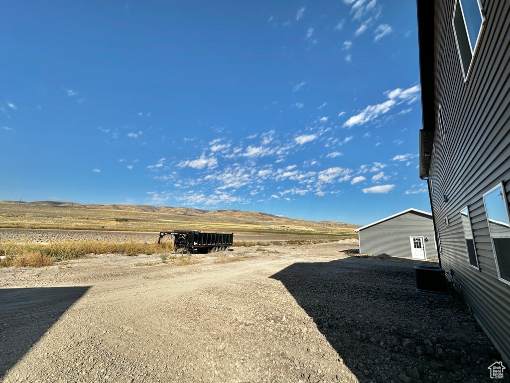 View of yard with a mountain view