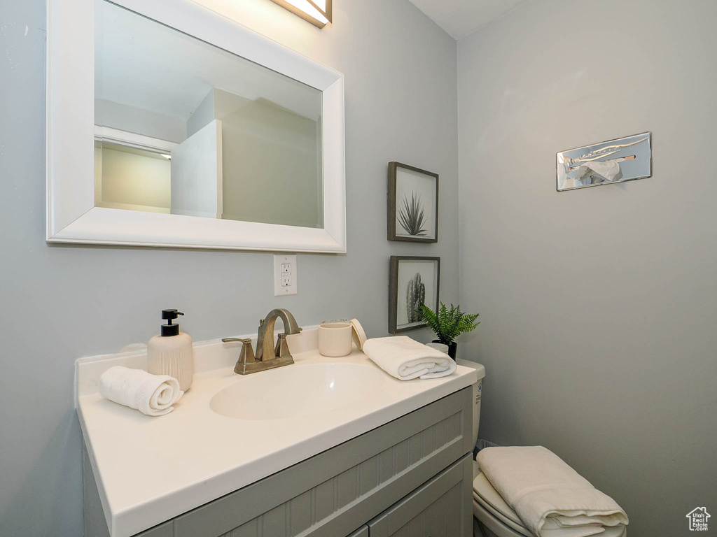 Bathroom with vanity and toilet