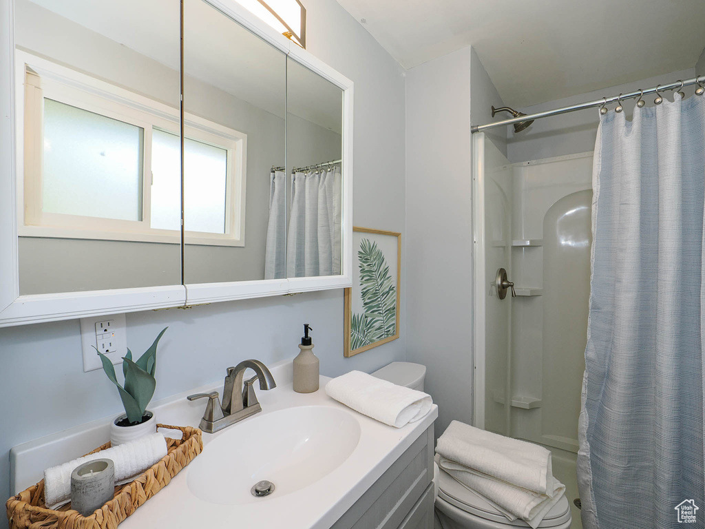 Bathroom with vanity and toilet