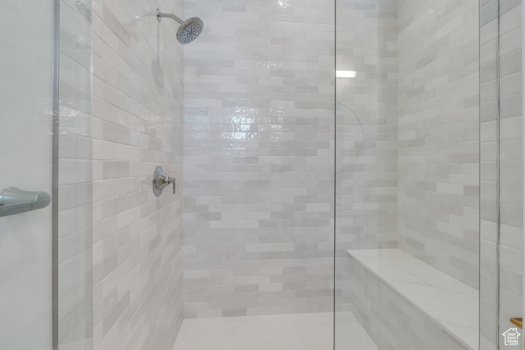 Bathroom with tiled shower