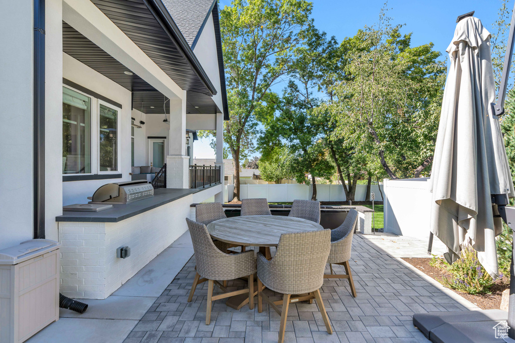 View of patio / terrace with area for grilling and exterior kitchen