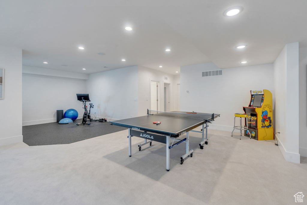 Game room with light carpet