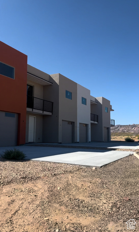 View of front of property featuring a balcony