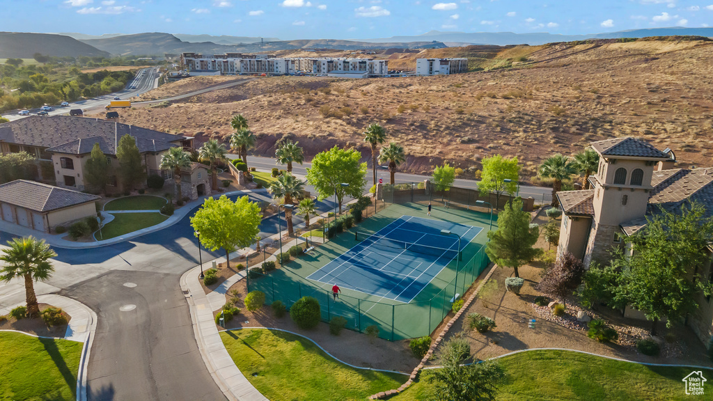 Birds eye view of property with a mountain view