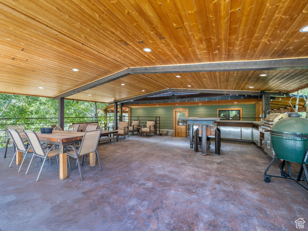 Interior space with vaulted ceiling and wood ceiling