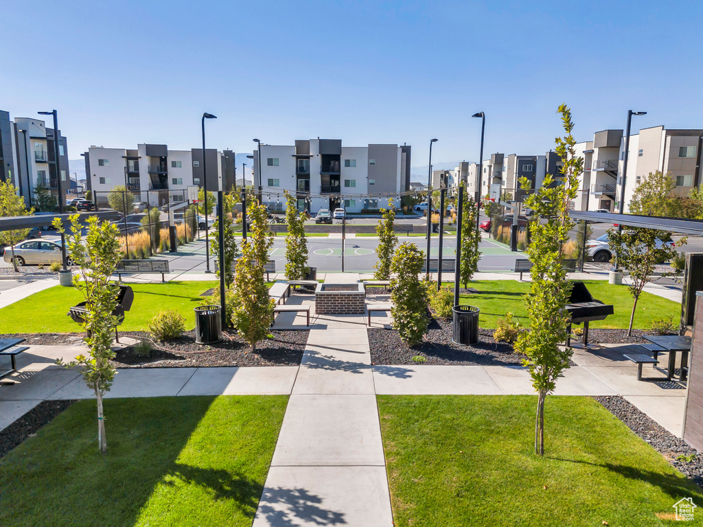 View of community featuring a lawn