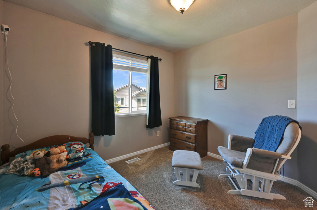 View of carpeted bedroom