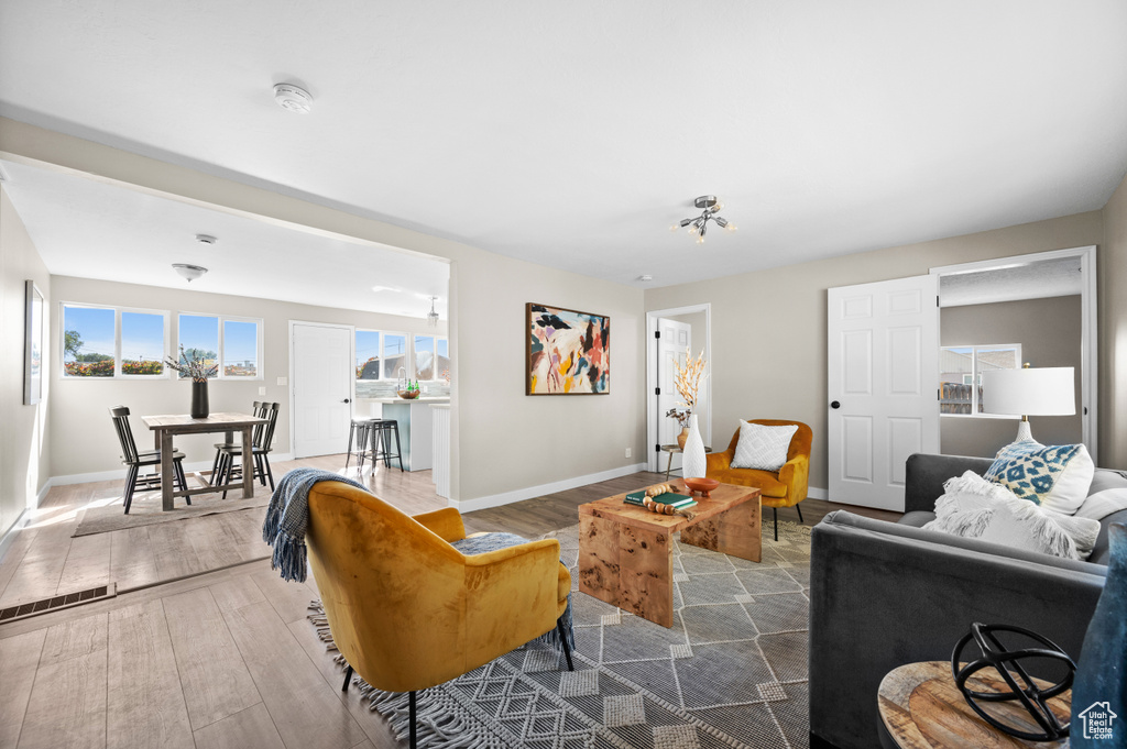 Living room with hardwood / wood-style floors