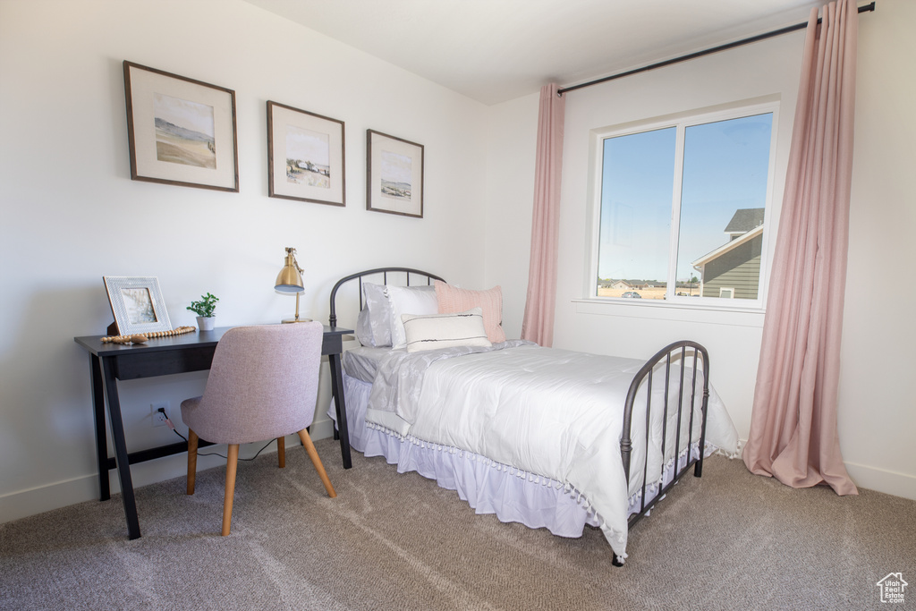 Bedroom with carpet