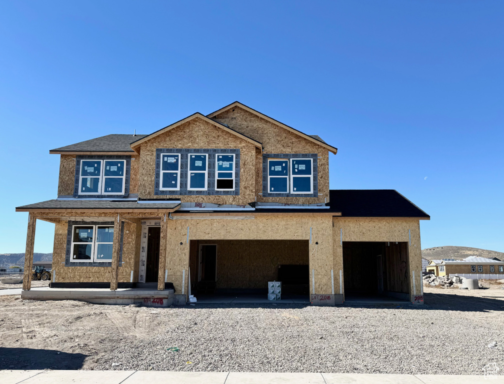 View of front of house with a garage