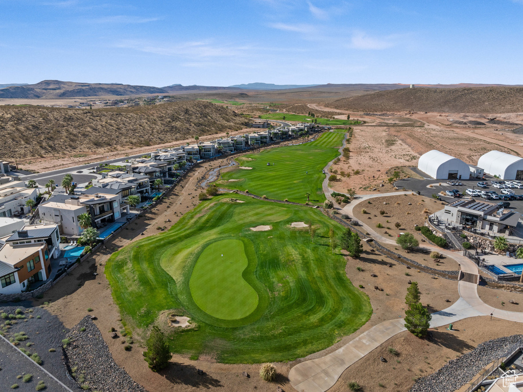 Birds eye view of property with a mountain view