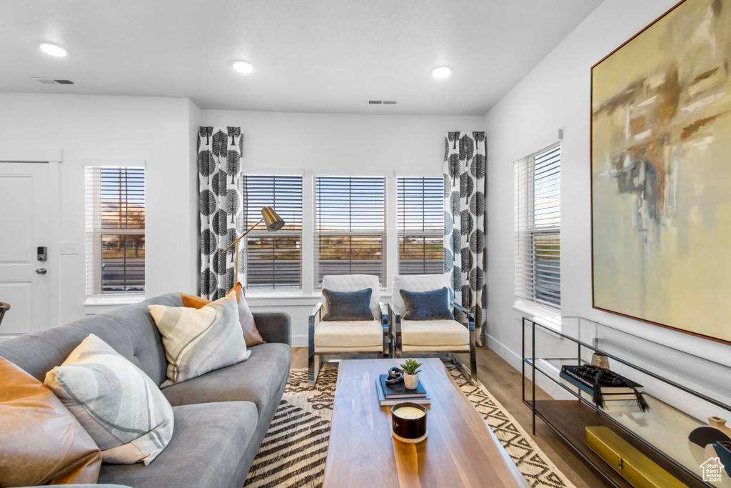 Living room with hardwood / wood-style floors