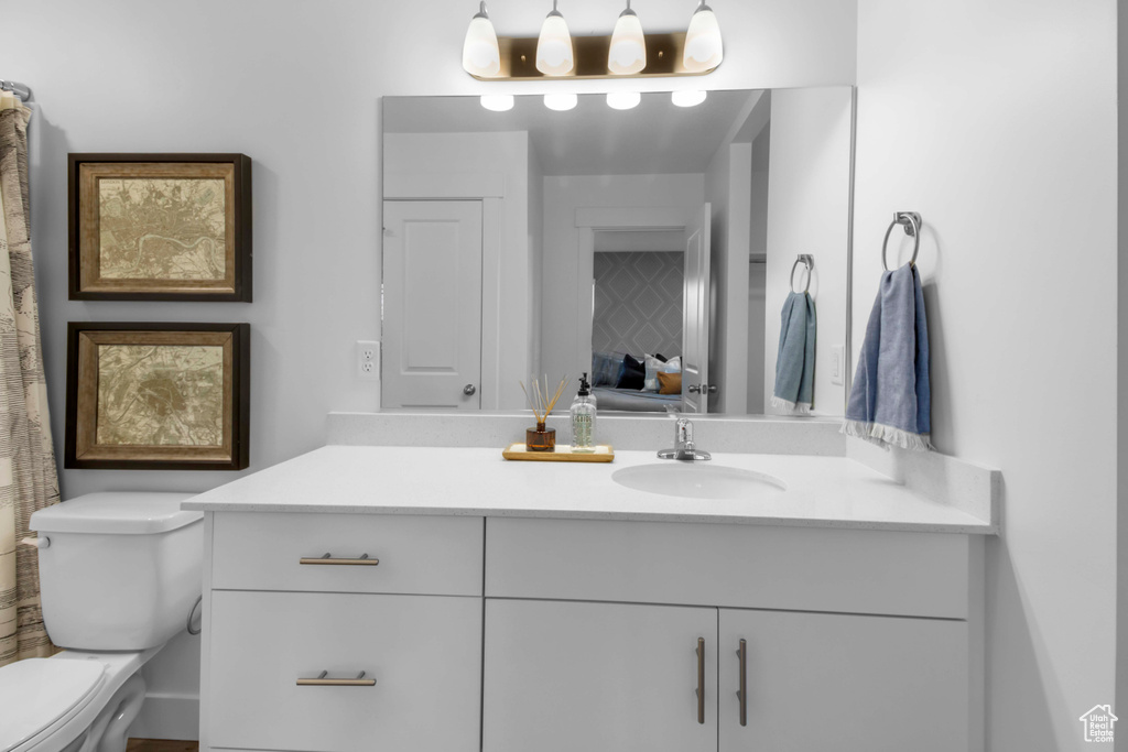 Bathroom with vanity and toilet