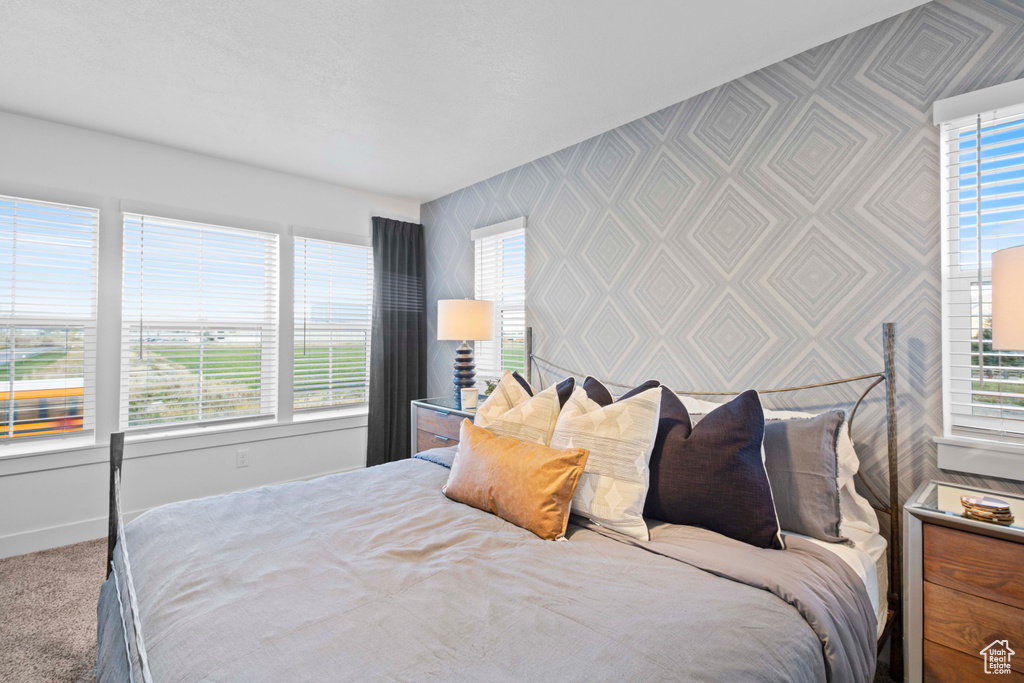 Bedroom featuring carpet flooring