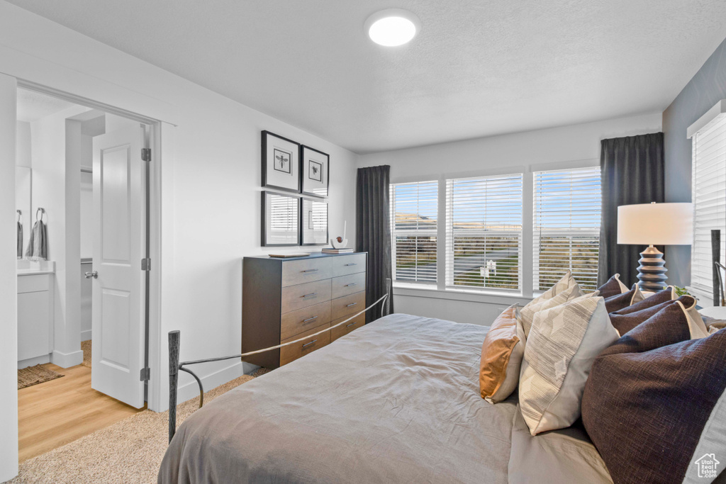 Bedroom with light wood-type flooring