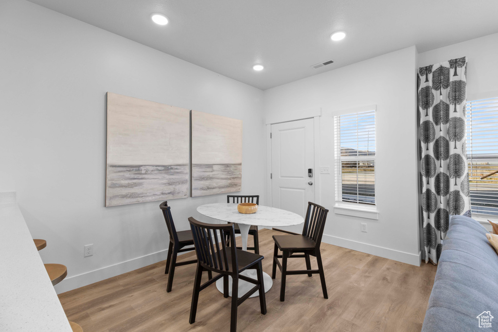 Dining area featuring light hardwood / wood-style flooring