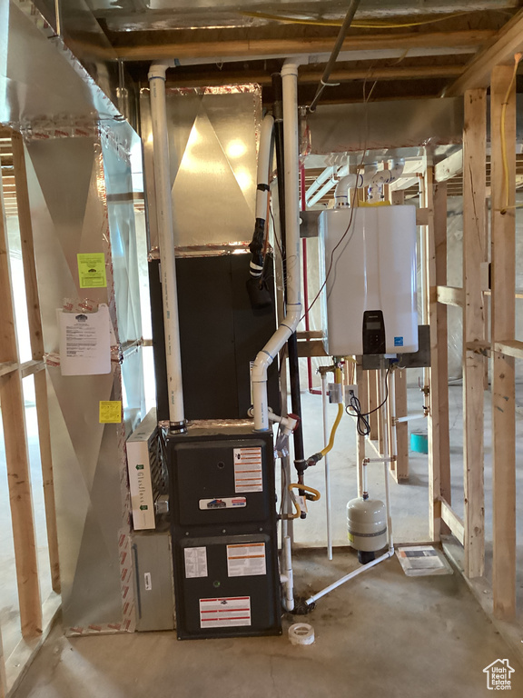 Utility room with tankless water heater