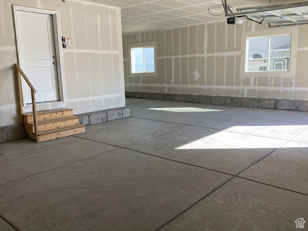 Interior space with plenty of natural light and concrete floors