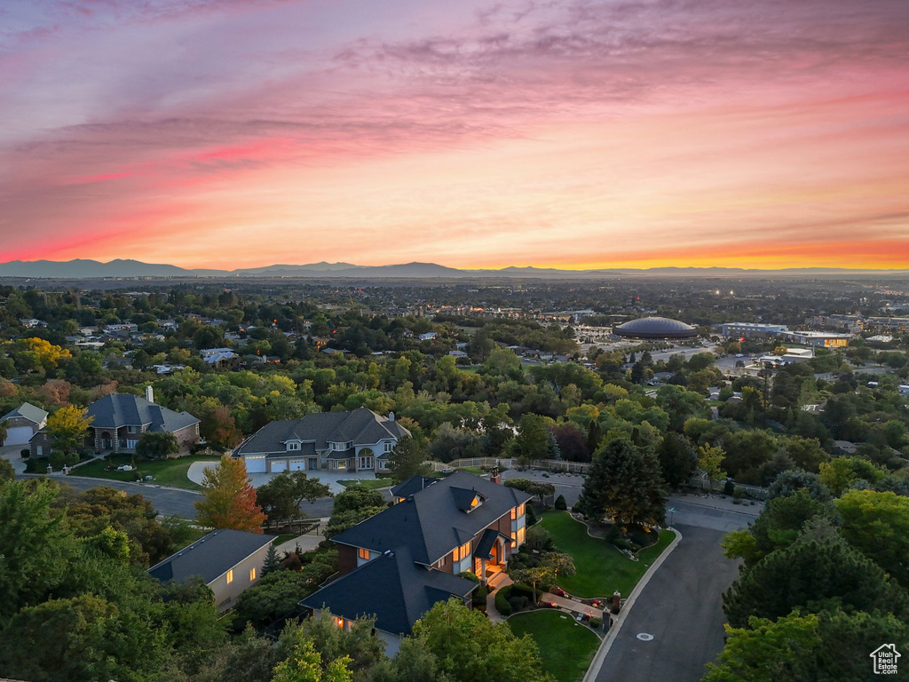 Aerial view at dusk featuring a mountain view