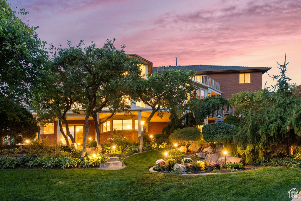 View of yard at dusk