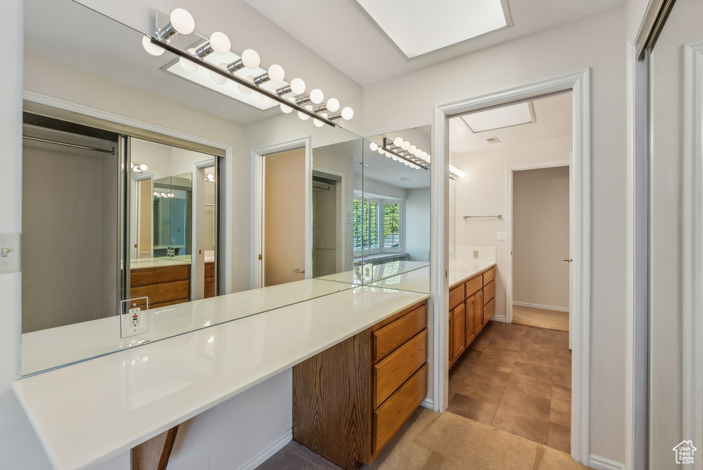 Bathroom with tile patterned floors