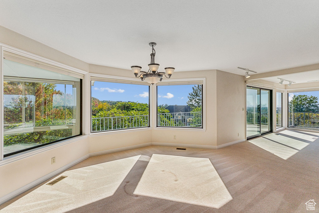 Interior space featuring a chandelier