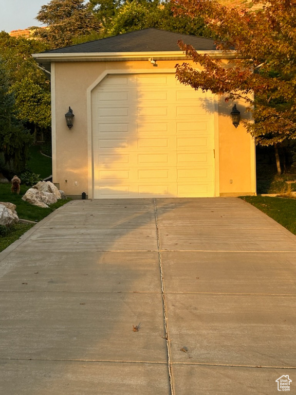 View of outdoor structure featuring a garage